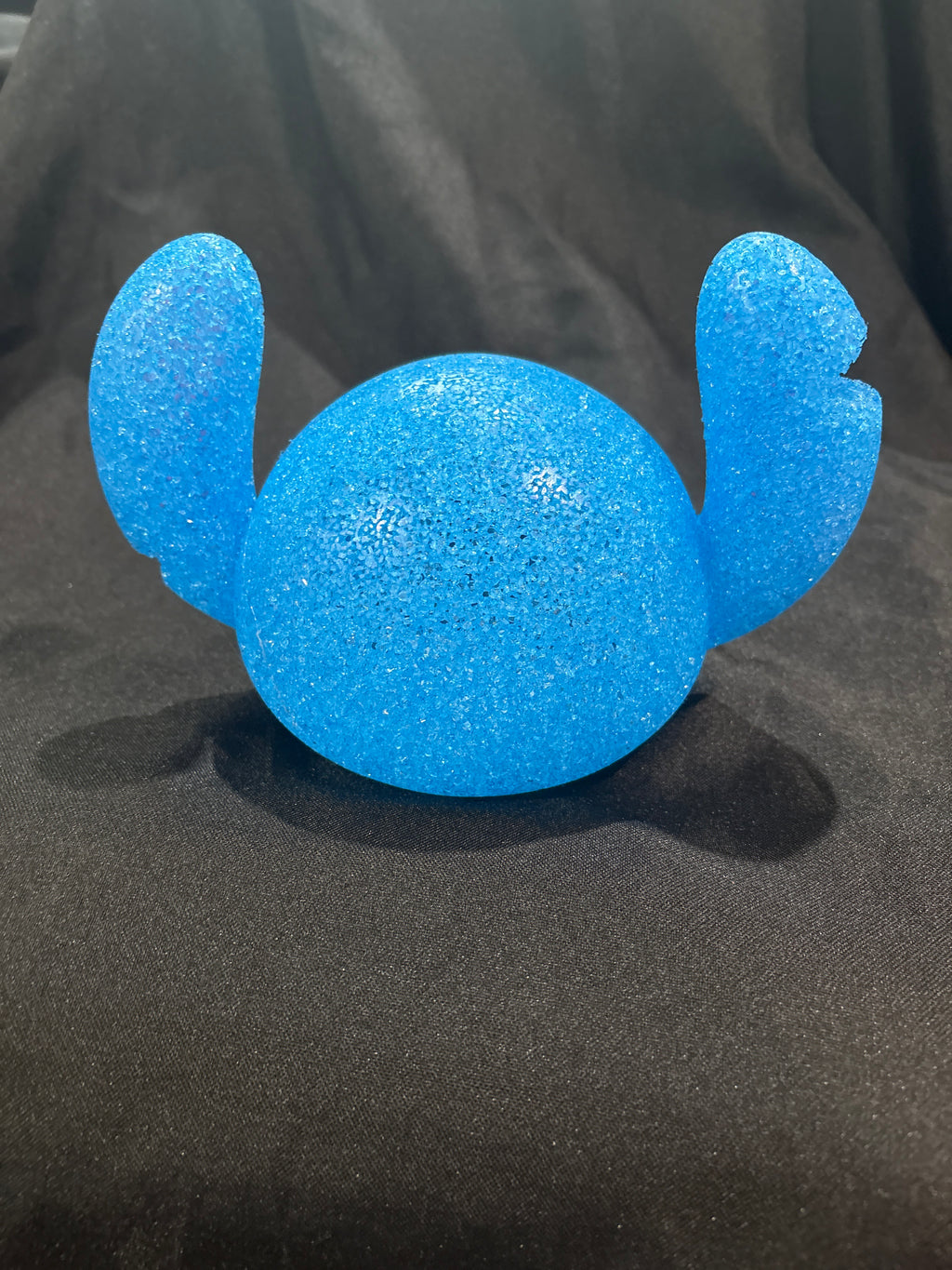 This is a Disney Stitch glitter projection night light.