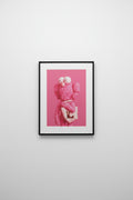 This is a pink KAWS character wall rug poster 21.5 X 32